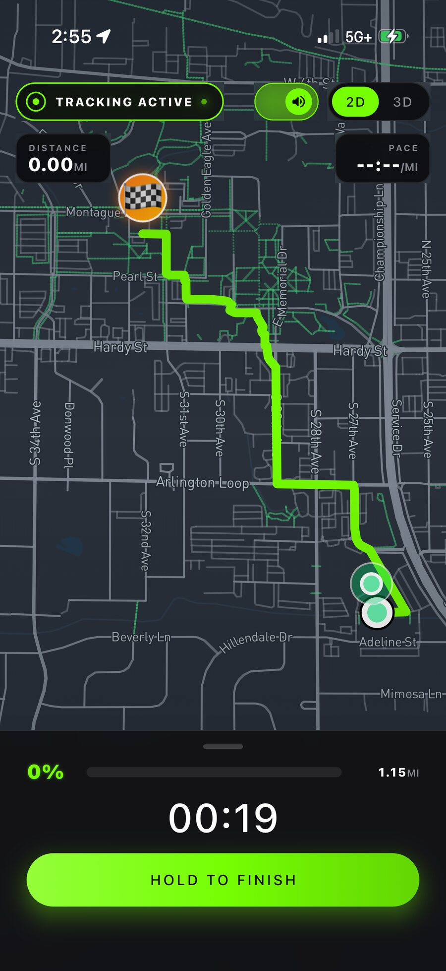 Pyre Fitness live run tracking screen with an active GPS route, distance, pace and a hold-to-finish control.
